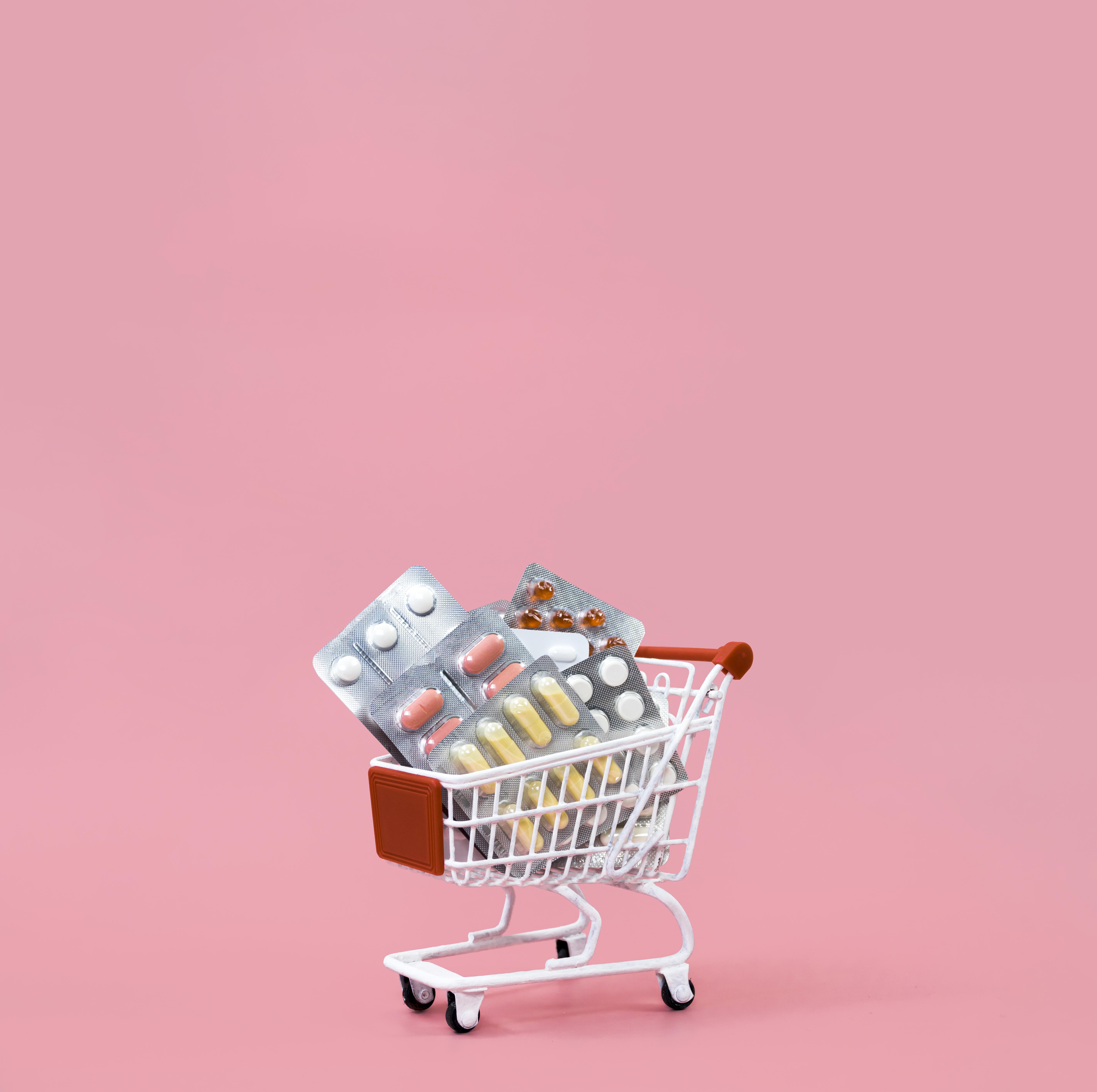 front-view-shopping-cart-with-pill-foils-copy-space.jpg